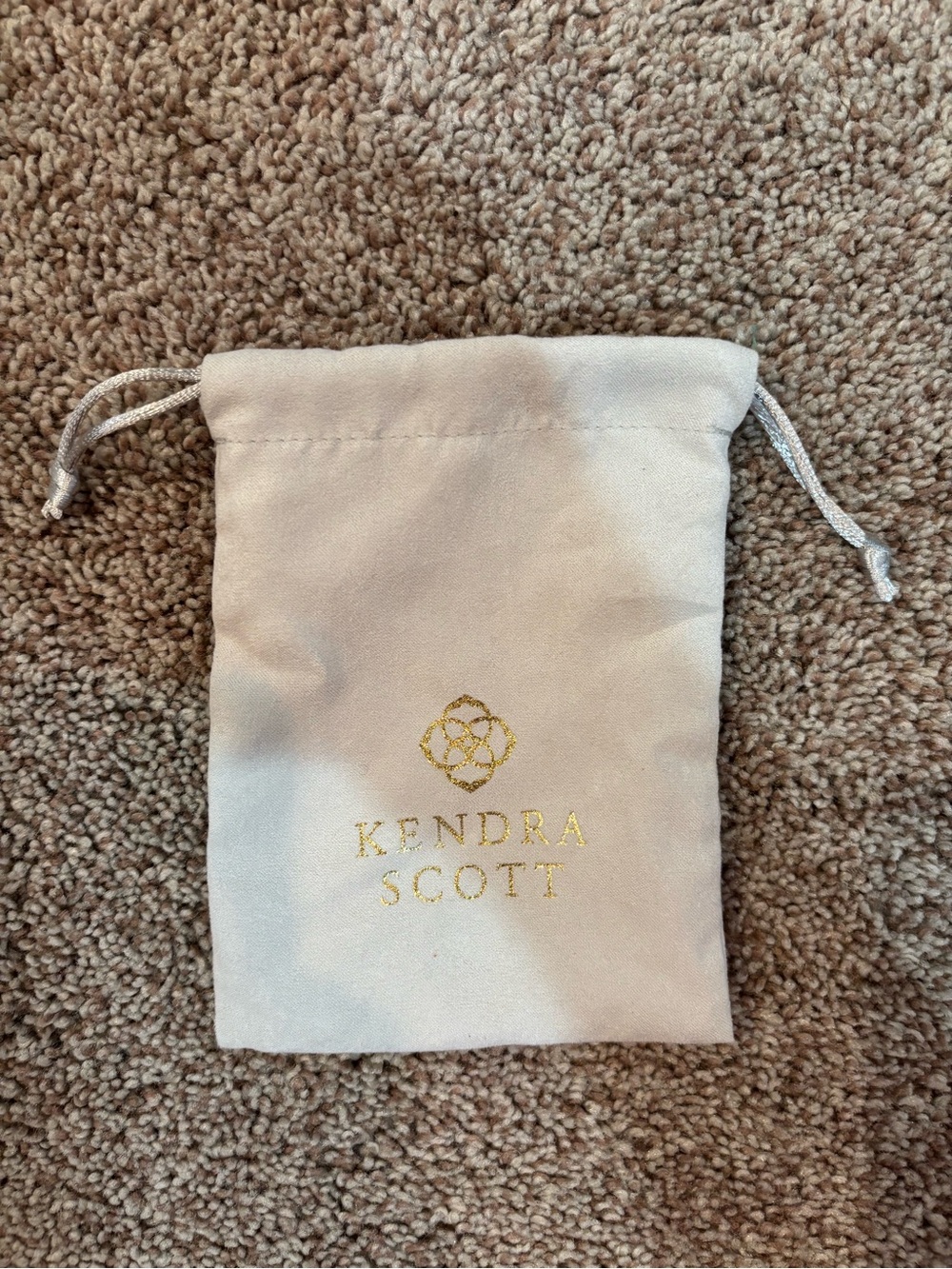 Kendra Scott Cream Drawstring Jewelry Pouch with Gold Logo